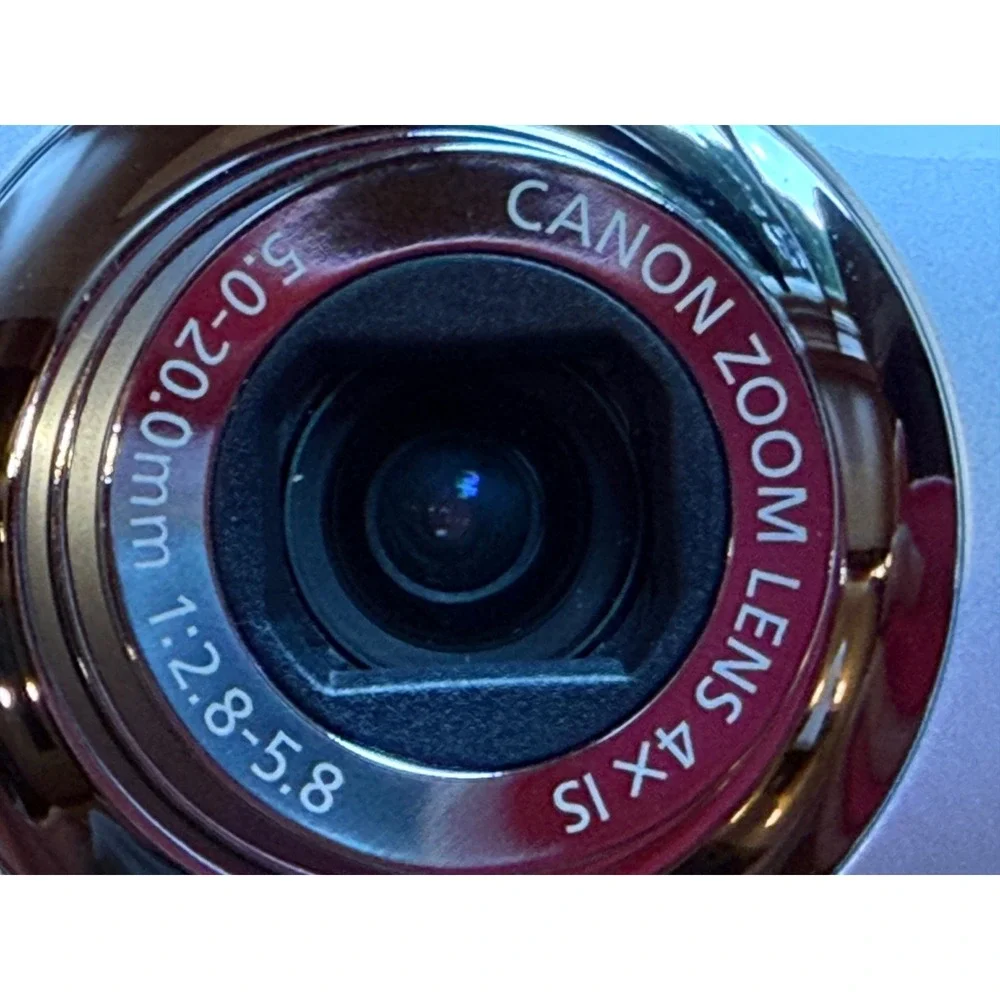 Canon Silver Digital Camera with Black Case and Charger